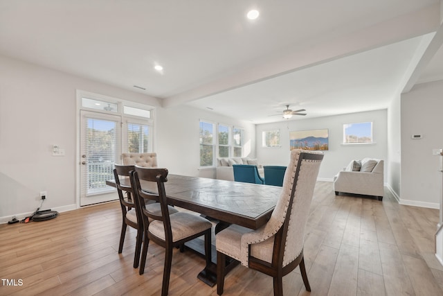 dining space featuring ceiling fan, plenty of natural light, and light wood-type flooring