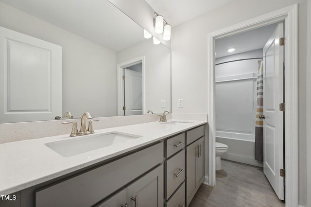 full bathroom featuring tile patterned flooring, vanity, shower / bath combination with curtain, and toilet