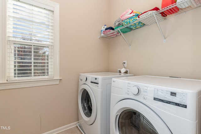 washroom with separate washer and dryer