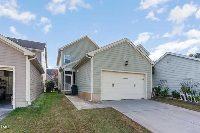 view of front of property with a front lawn and a garage