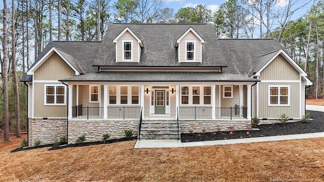 view of front of property featuring covered porch