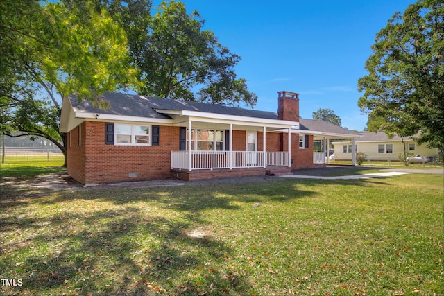 view of front of home featuring a front lawn and covered porch