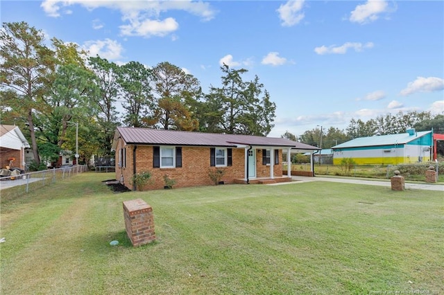 view of front of house with a front lawn