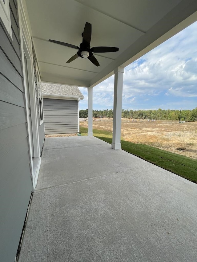 view of patio with ceiling fan