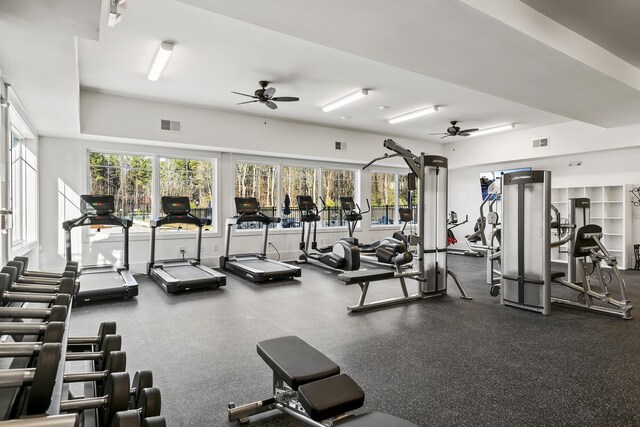 exercise room with ceiling fan