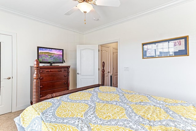 bedroom featuring ornamental molding, carpet floors, and ceiling fan