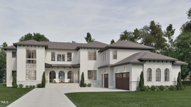 view of front of property featuring a garage and a front lawn