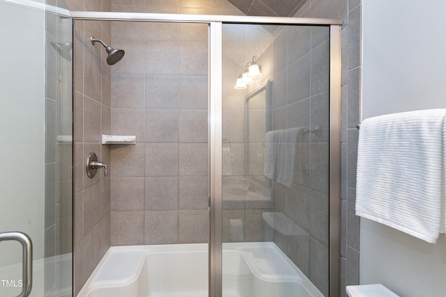 bathroom featuring separate shower and tub