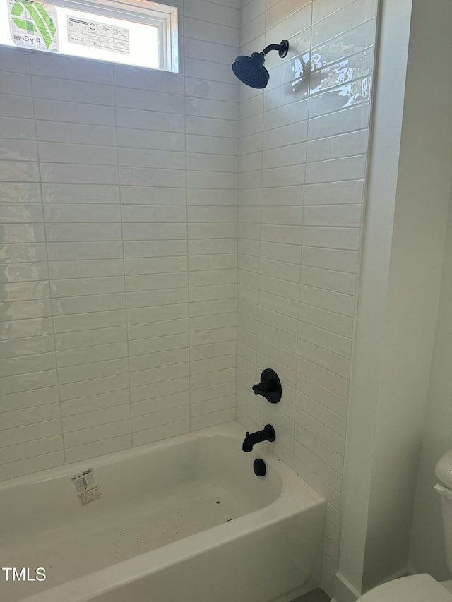 full bath with toilet and bathtub / shower combination