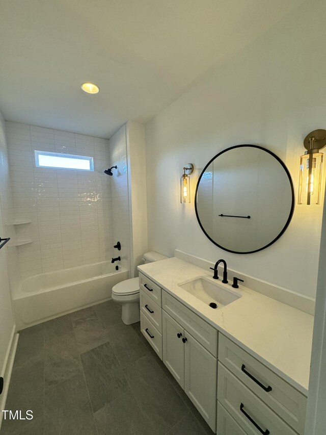 full bath featuring toilet, bathtub / shower combination, and vanity