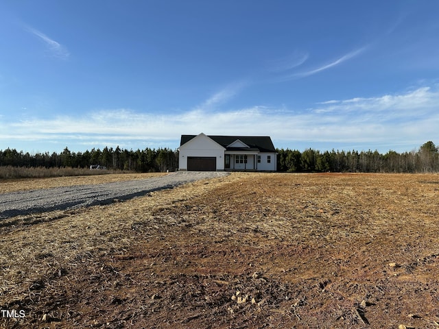 view of front of property featuring a garage and driveway