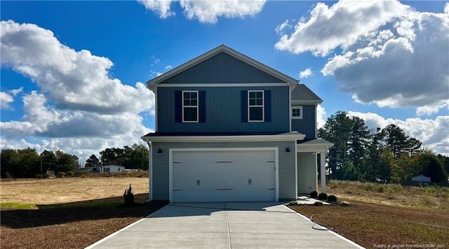 view of front of property featuring a garage