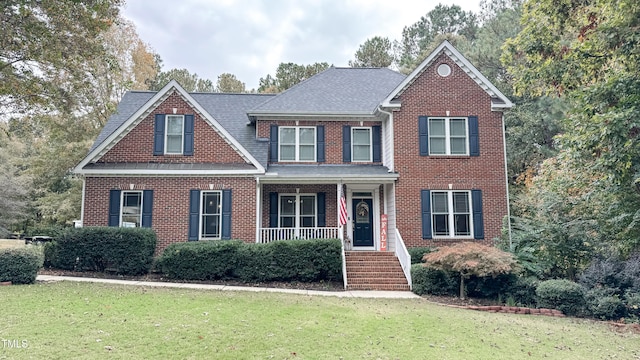 view of front of home featuring a front yard