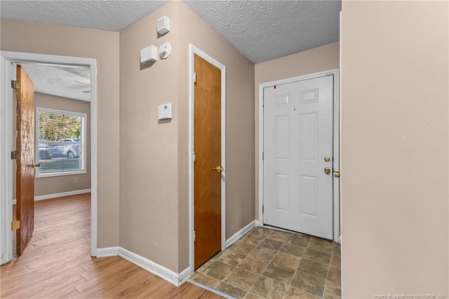 1018 Wood Creek Dr Unit 3, Fayetteville, NC 28314 - foyer featuring a textured ceiling