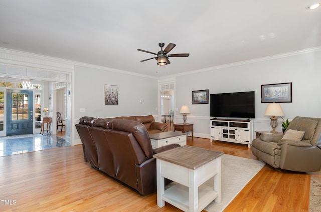 166 Weldon Dr, Clayton, NC 27520 - living area with crown molding, a ceiling fan, wood finished floors, and baseboards