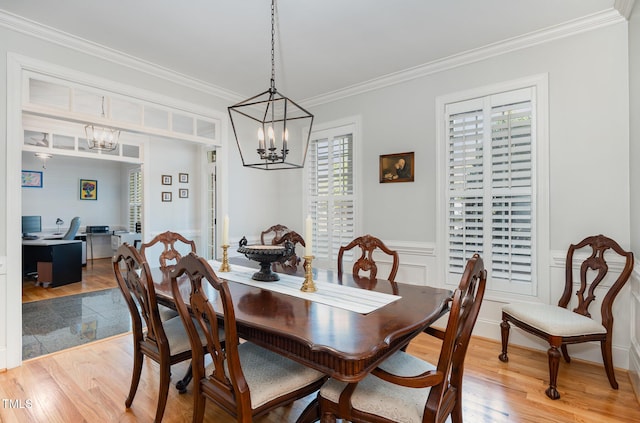 166 Weldon Dr, Clayton, NC 27520 - dining space featuring a chandelier, crown molding, an office area, and light wood-type flooring