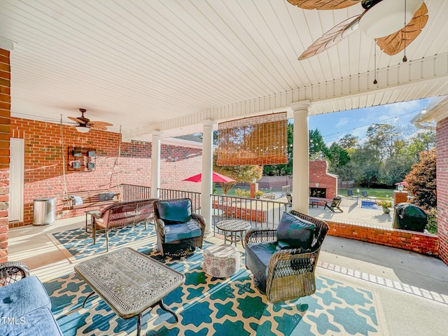 166 Weldon Dr, Clayton, NC 27520 - view of patio with a ceiling fan and an outdoor living space with a fireplace