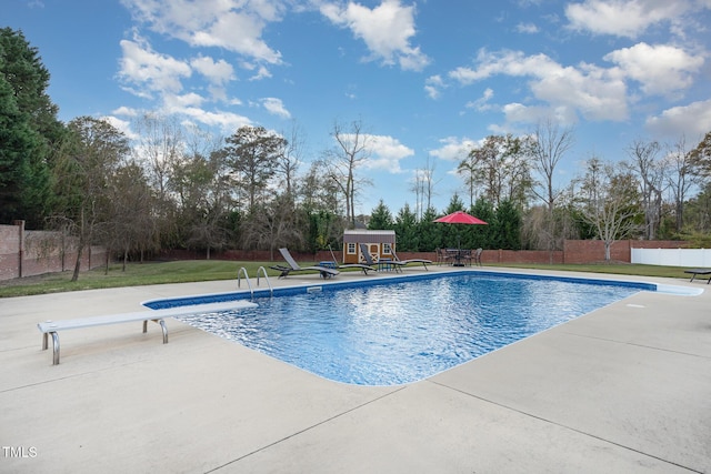 166 Weldon Dr, Clayton, NC 27520 - view of swimming pool with a diving board and a patio