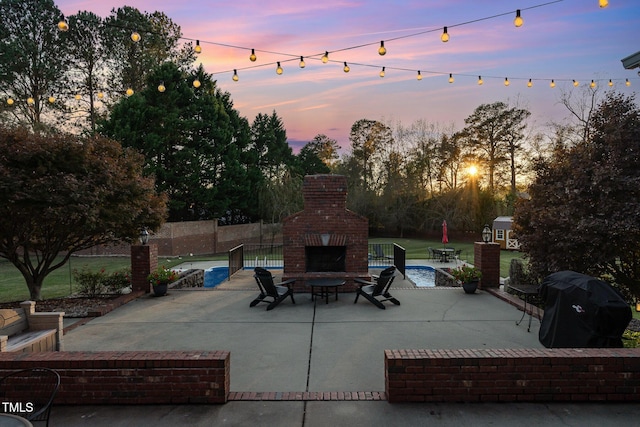 166 Weldon Dr, Clayton, NC 27520 - view of patio / terrace featuring an outdoor brick fireplace and grilling area