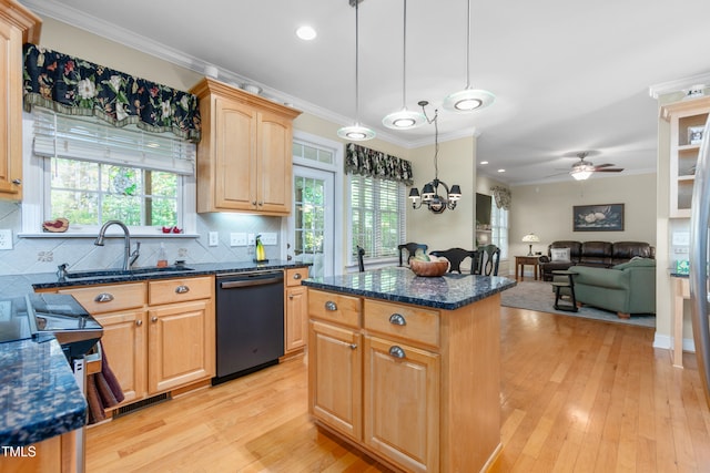 kitchen with black dishwasher, light wood-type flooring, a center island, and plenty of natural light