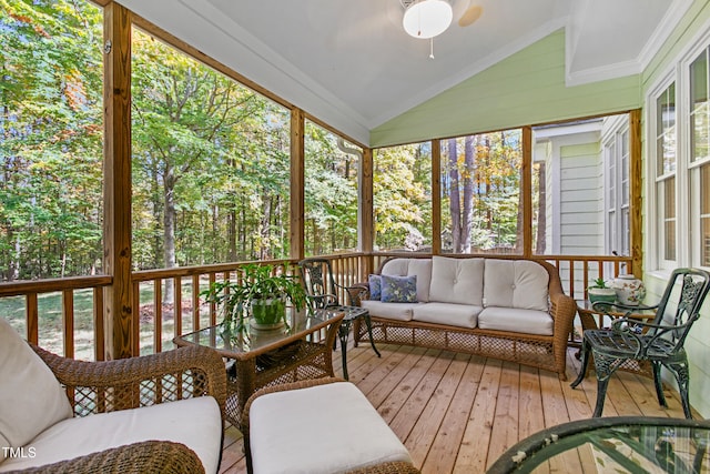 sunroom featuring lofted ceiling