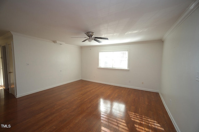 unfurnished room featuring ceiling fan, dark hardwood / wood-style flooring, and ornamental molding