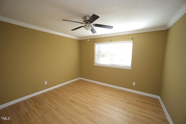 spare room featuring ceiling fan, light hardwood / wood-style floors, and crown molding