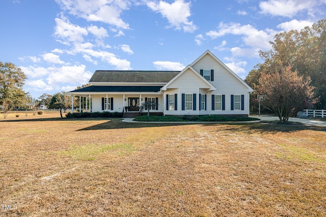 view of front of home featuring covered porch and a front lawn