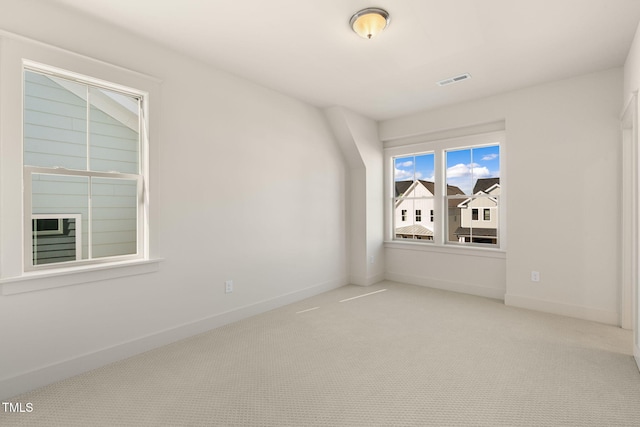 view of carpeted spare room