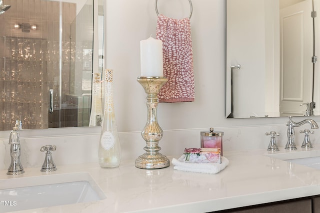 bathroom with vanity and an enclosed shower