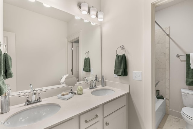 full bathroom featuring vanity, toilet, and tiled shower / bath combo