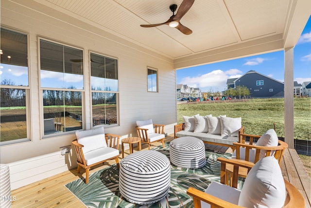 view of patio featuring outdoor lounge area, a deck, and ceiling fan