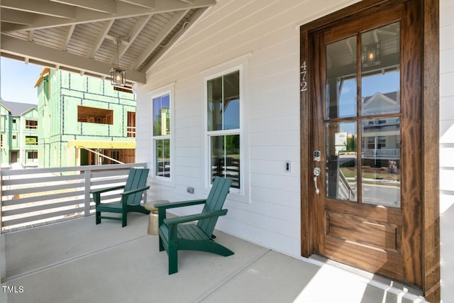 view of patio featuring a porch