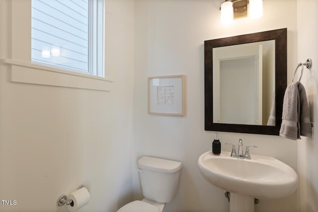 bathroom featuring sink and toilet