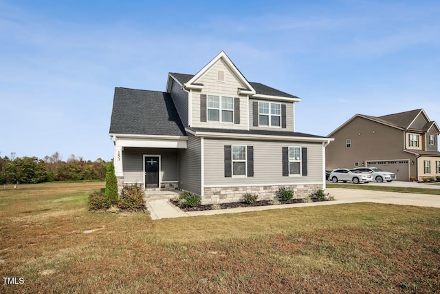 craftsman-style home with a garage and a front lawn