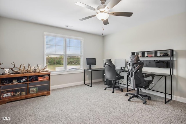 office area featuring ceiling fan and carpet floors