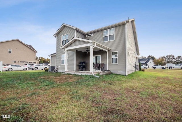 view of front facade featuring a patio area and a front lawn