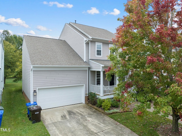 view of front of home with a front yard and a porch