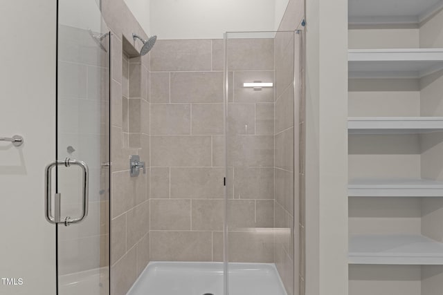 bathroom featuring an enclosed shower