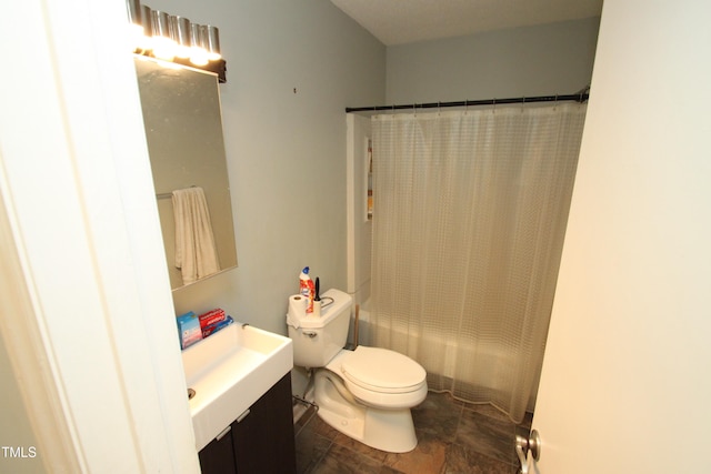 full bathroom with vanity, toilet, and shower / bath combination with curtain