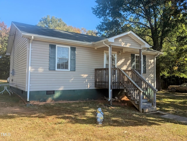 view of front of home with a front yard