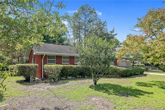 view of front of home with a front lawn