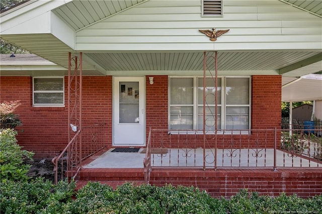 entrance to property with covered porch