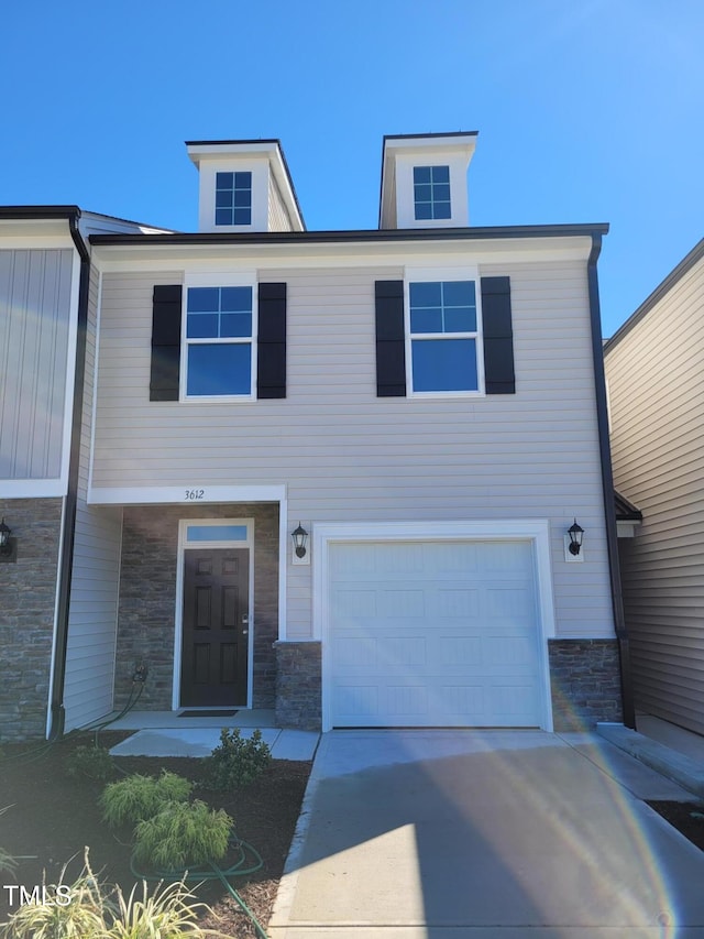 3612 Tarmac Rd Unit Ep 127, Wilson, NC 27896 - townhome / multi-family property featuring stone siding, driveway, and a garage