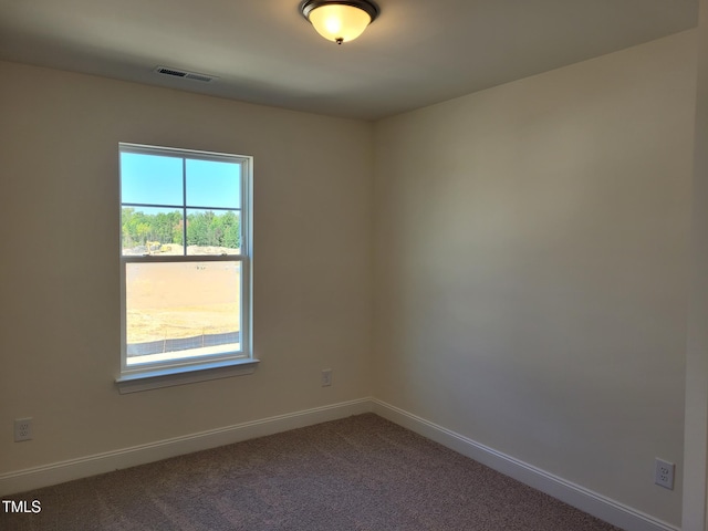 3612 Tarmac Rd Unit Ep 127, Wilson, NC 27896 - spare room featuring baseboards and carpet
