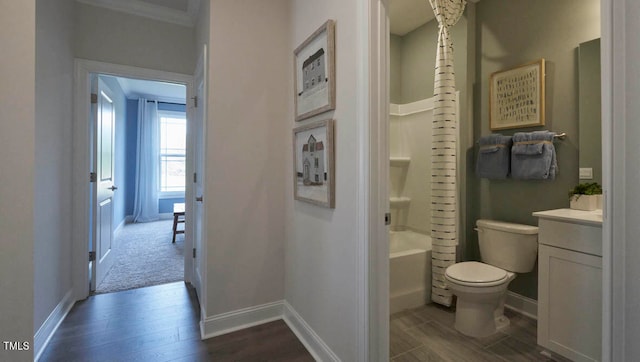 full bathroom with vanity, shower / tub combination, hardwood / wood-style flooring, and toilet