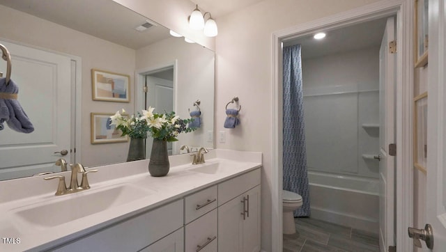 full bathroom featuring vanity, shower / bath combination with curtain, wood-type flooring, and toilet