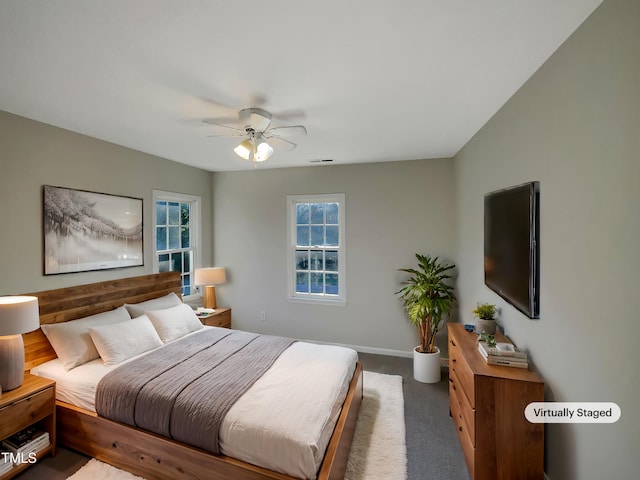 carpeted bedroom featuring ceiling fan