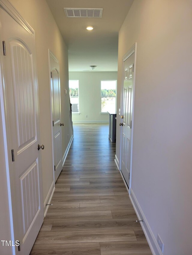 3614 Tarmac Rd Unit Ep 128, Wilson, NC 27896 - corridor featuring wood finished floors, baseboards, and recessed lighting