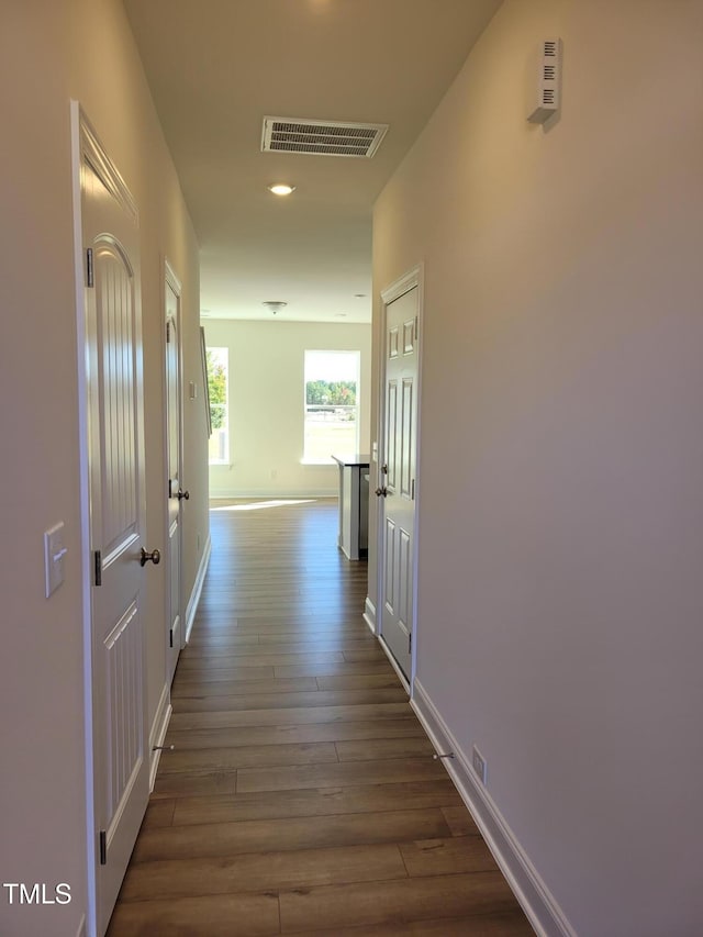 3616 Tarmac Rd Unit Ep 129, Wilson, NC 27896 - corridor with dark wood-style flooring and baseboards